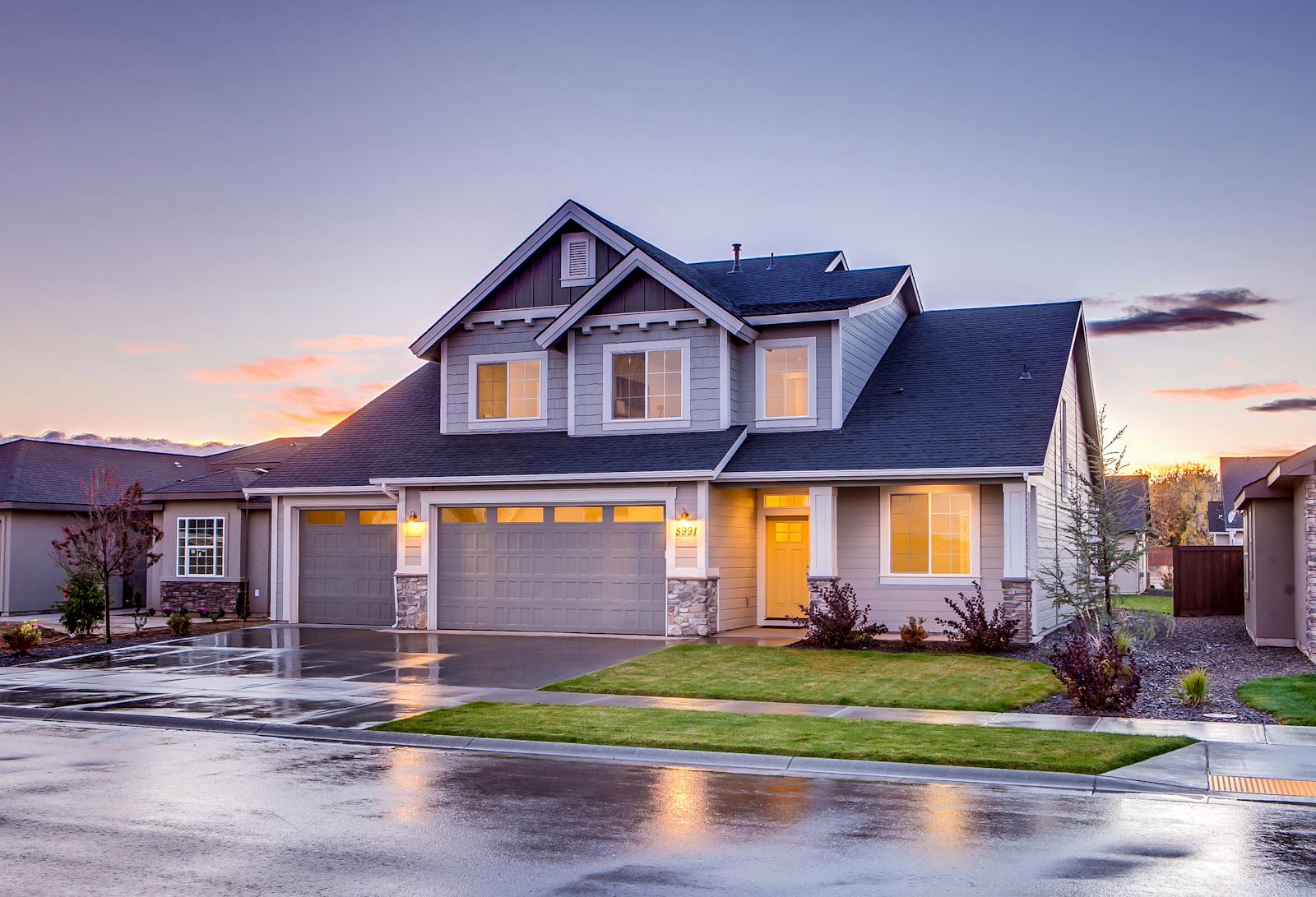 homeowners, home, elegant suburban home with driveway at sunset showcasing modern architecture.